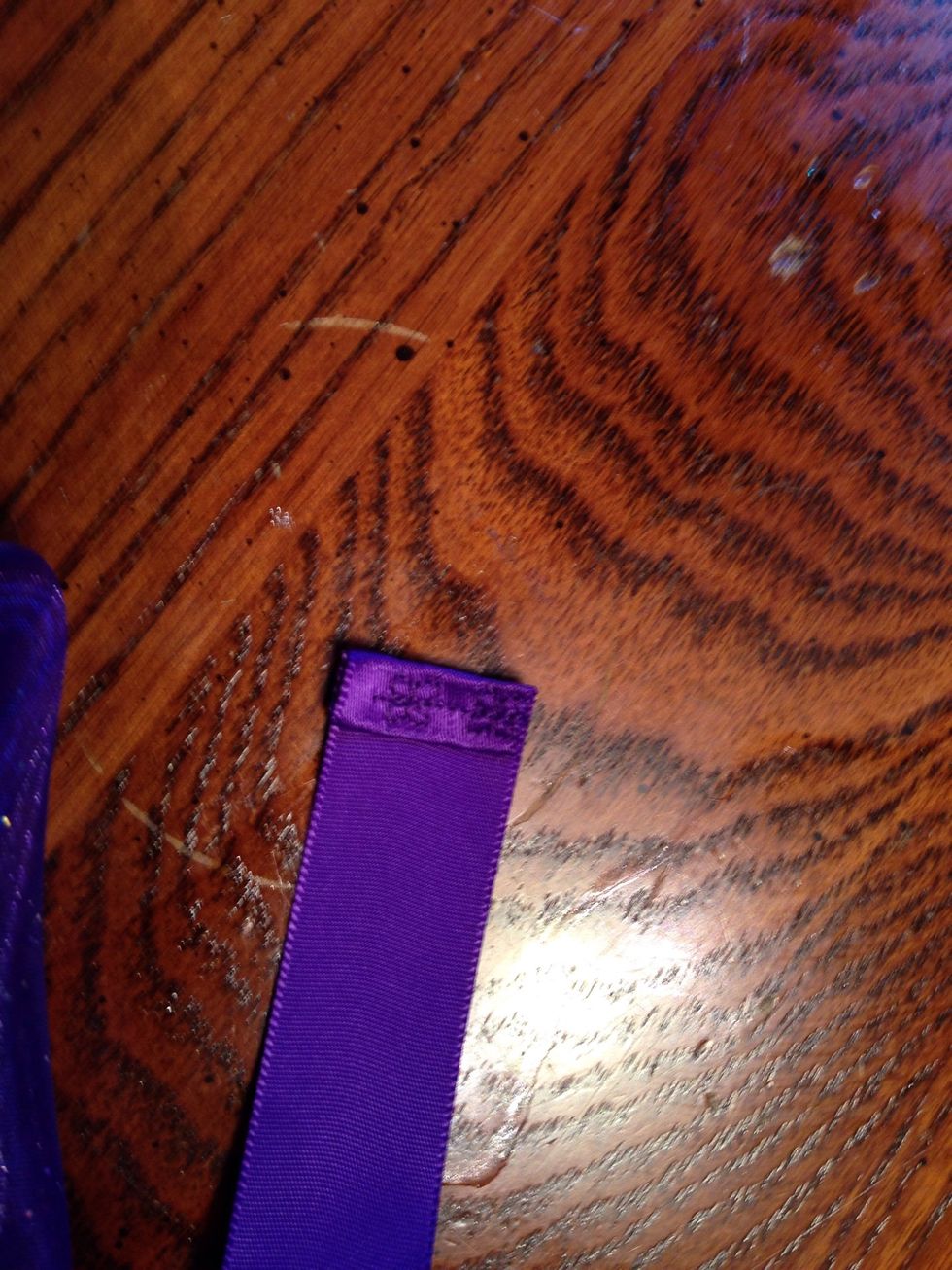 I folded and sewed a flower pattern onto the edges to keep from fraying.