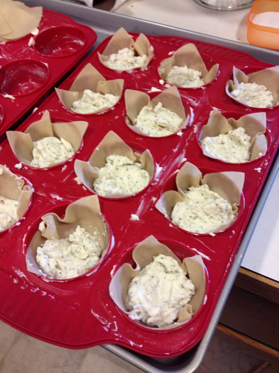 I forgot the picture with just the wontons, simply add them in each cup and push it down, then add a bit of the cheese, a little will go a long way!