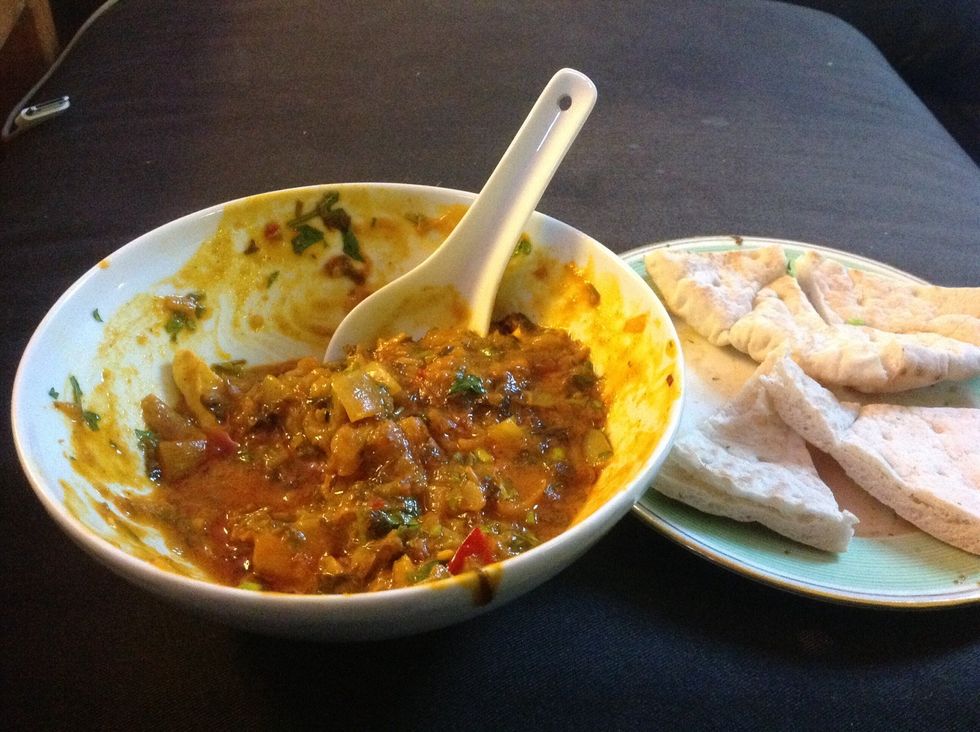 I forgot to take a pic before I started scarfing this down. Oops. Chopped parsley and cilantro and naan on the side. Yummmmmmmmm. Stay safe!
