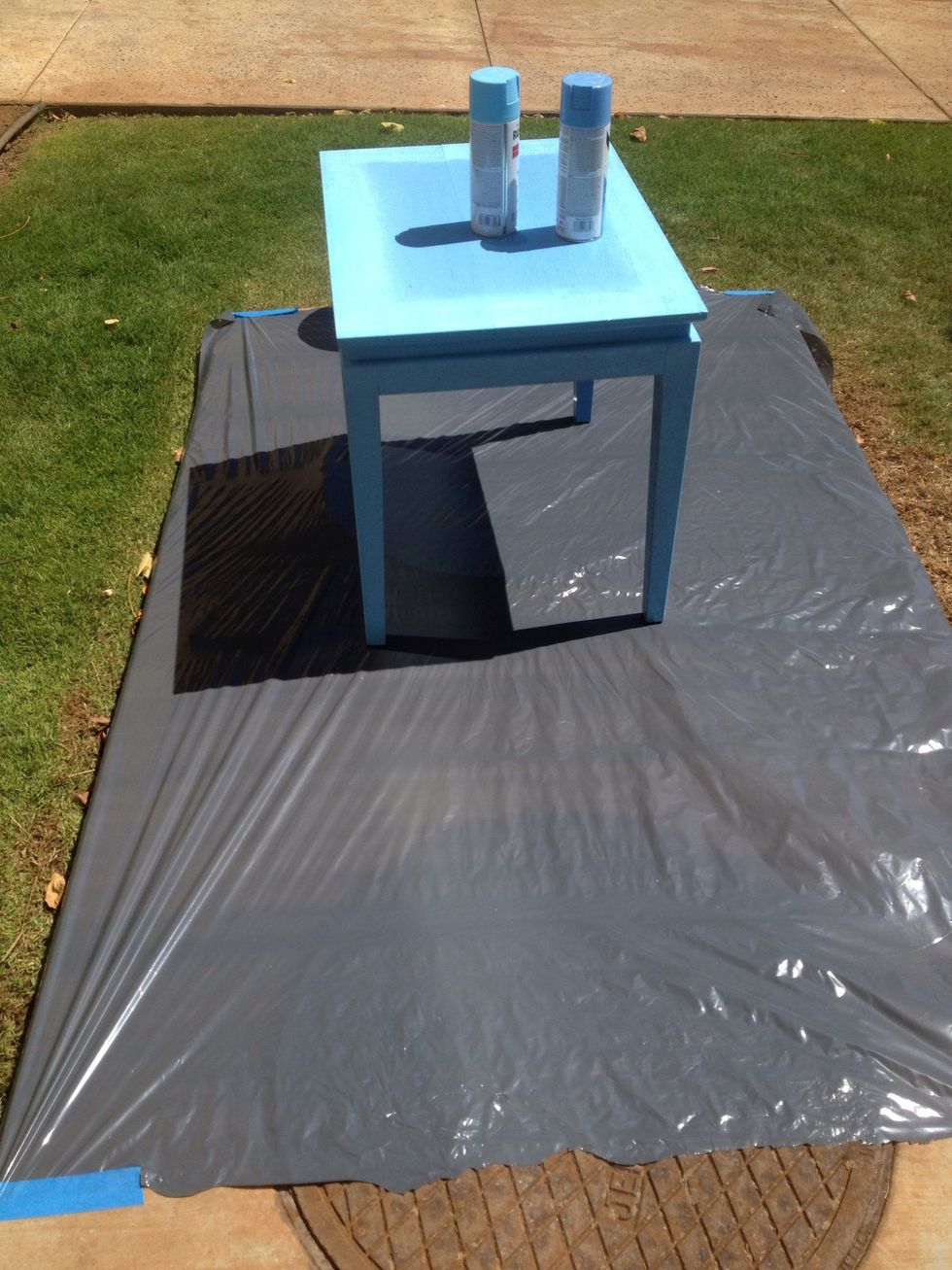 I forgot to take a picture of the drop cloth. Cut up a garbage bag and tape it down to keep from ruining the surface your working on