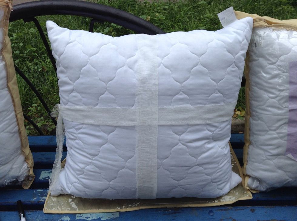 I found bandage in my backpack and made a cross over the pillow to make white spaces between parts of the sight . You can use any kind of tape to do so.