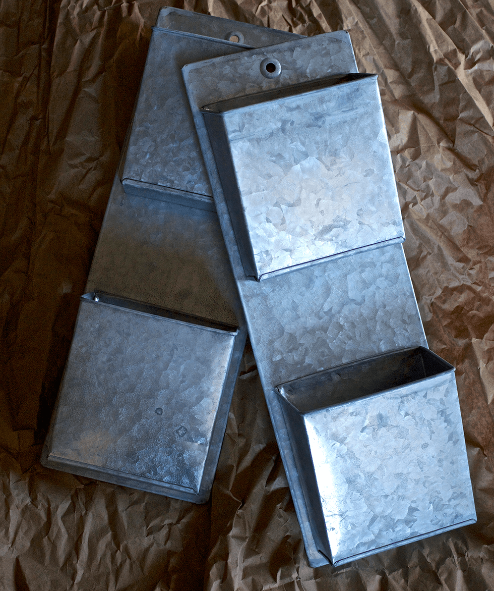 I found these great little tin boxes on Pick Your Plum, but any similar box would work. Available space on each front was 5" x 5.5"