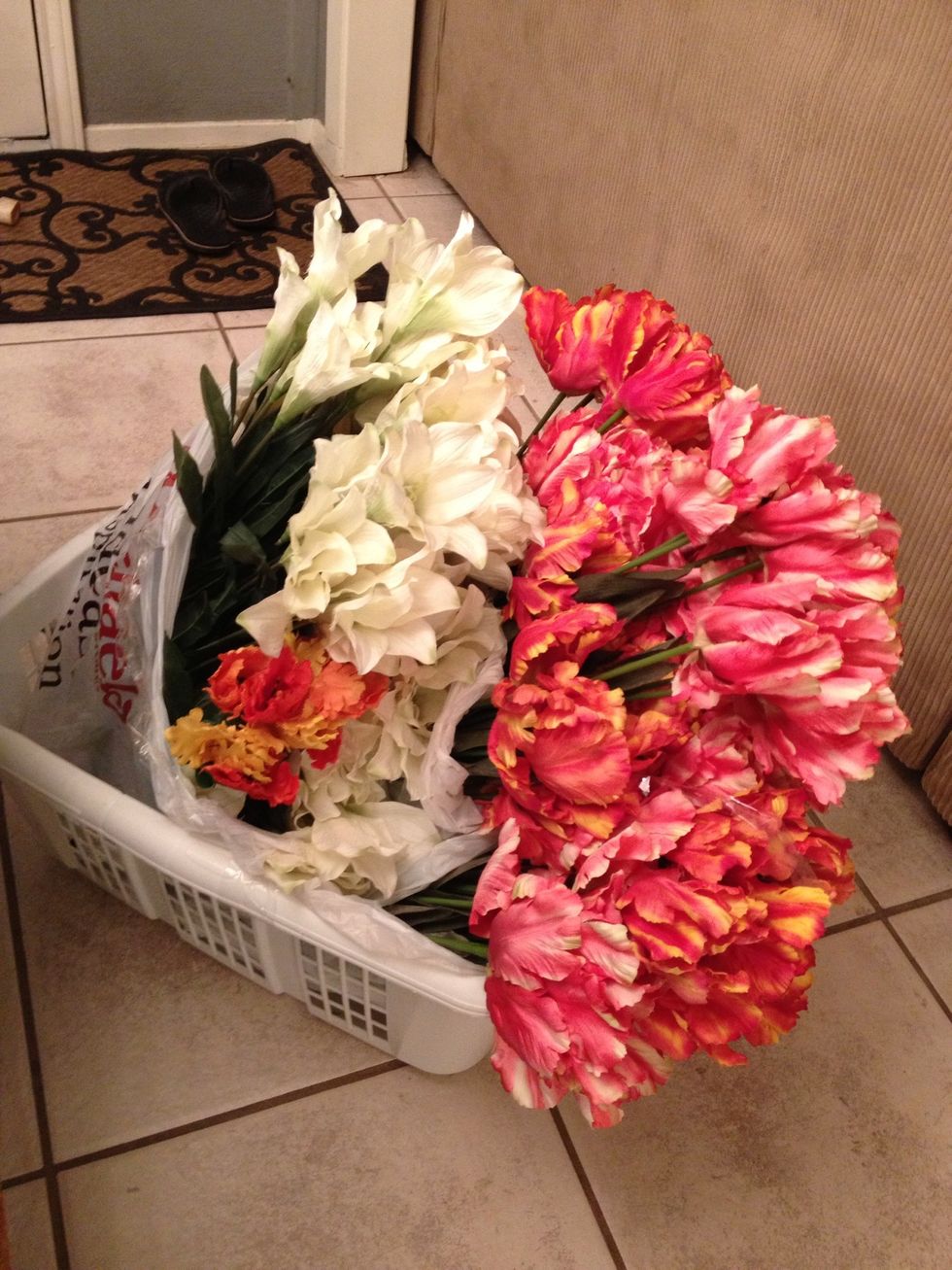 I found this basket with flowers at Goodwill for $12! You could buy fake flowers anywhere for cheap. And if you're fancy, use real ones.