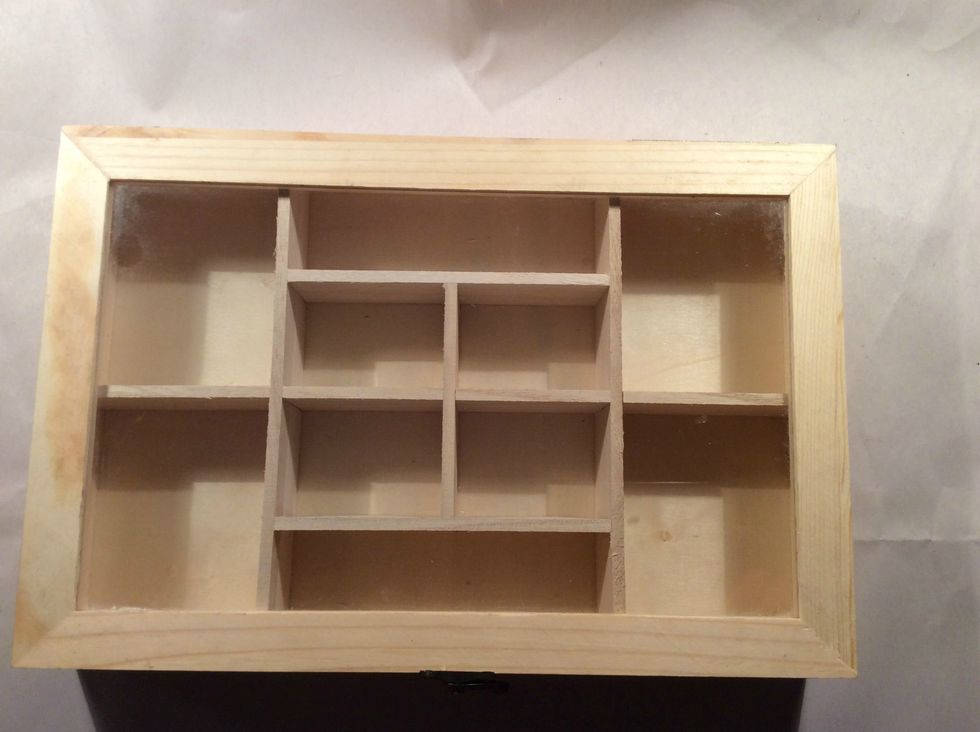 I found this pine box at Hobby Lobby for $6.99 and had a 40% coupon so this was a great buy. I knew it would be fun to create something to hold all my steampunk embellies.