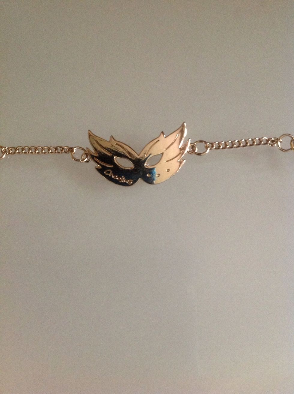 I found this thing at the craft store, liked it a lot but didn't know what to do with it, so I thought I'd make it a bracelet. You can even use a plain chain instead of something like this.