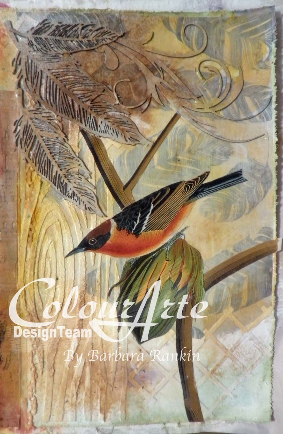 I fussy cut this image of a bird on a branch from an old calendar and adhered to the page with my mixed media adhesive (or gel medium), as shown.
