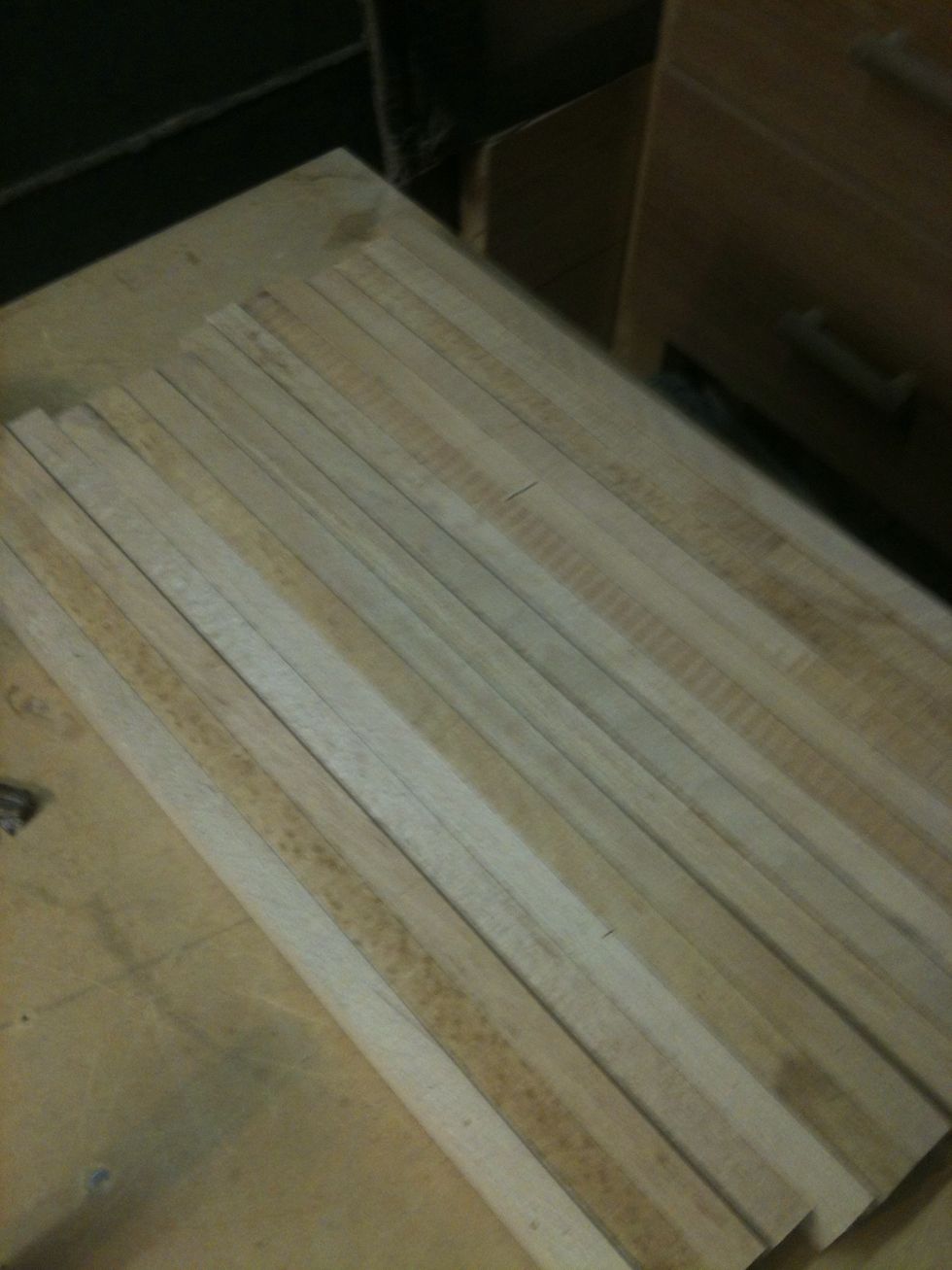 I gather all the pieces of wood. I'm looking for the straightest ones to use. I'm needing about 16 pieces. That ends up being 9 3/4" wide. If you want a bigger one than add more pieces of wood.