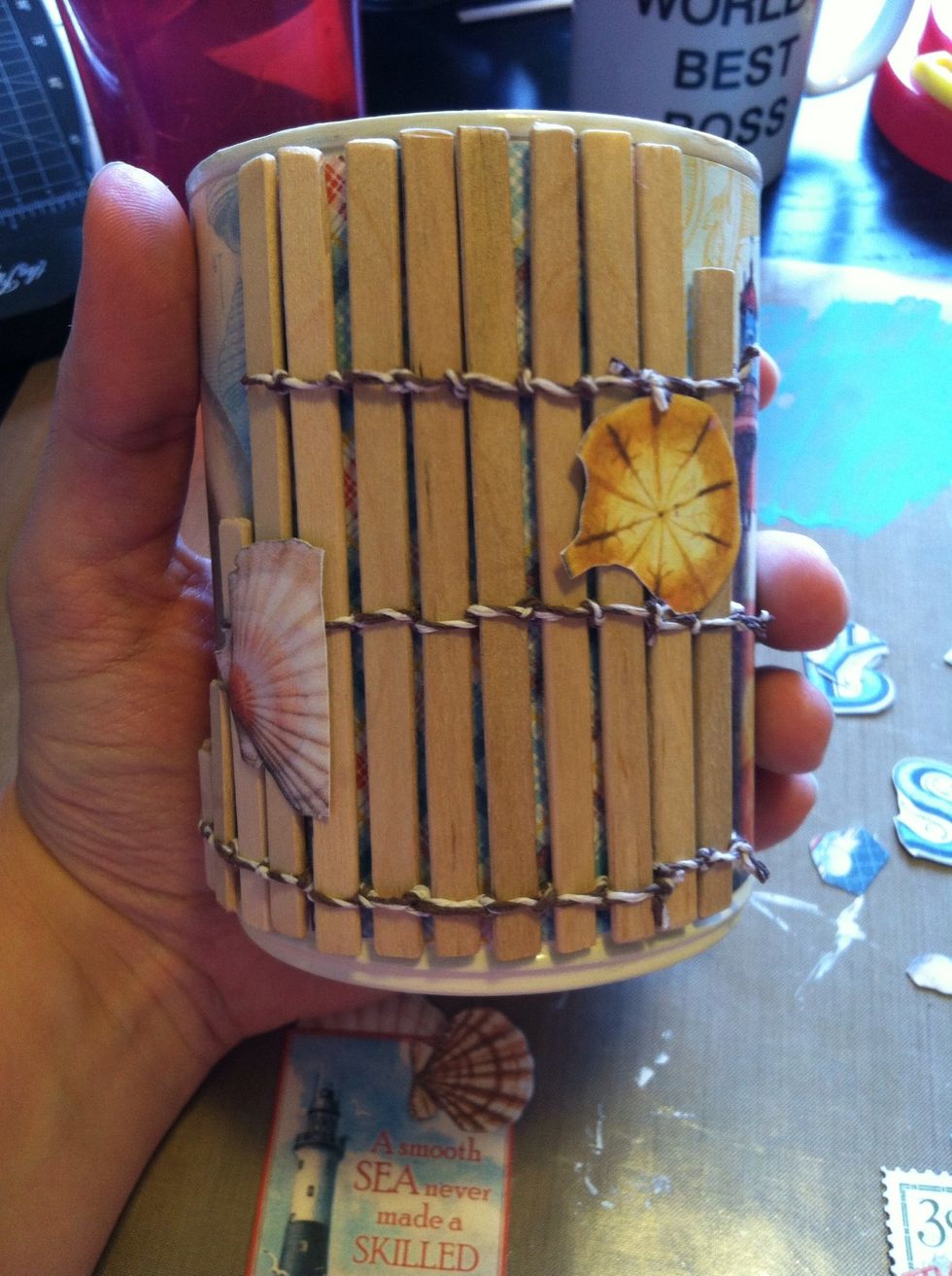 I glued a few of the partial shells onto the wood fence base.