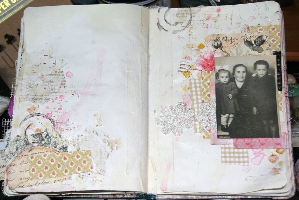 I glued lace and the photo on the right page and papers on the left page.