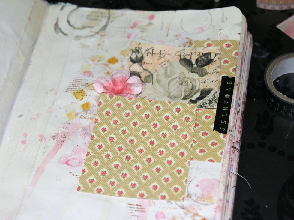 I glued papers and a flower.