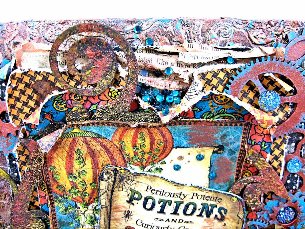 I glued rhinestone gems in between book pages and scattered randomly onto canvas.