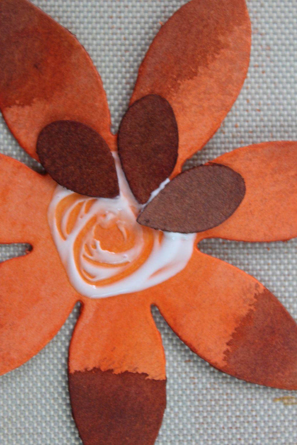 I glued together these little seed looking pieces to the ,middle of a couple of the flowers.