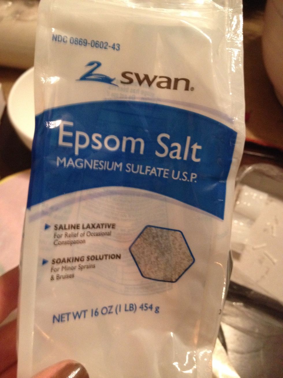 I got mine at the dollar store. I used one whole bag of Epsom salt with about a palmful of glass for each jar.