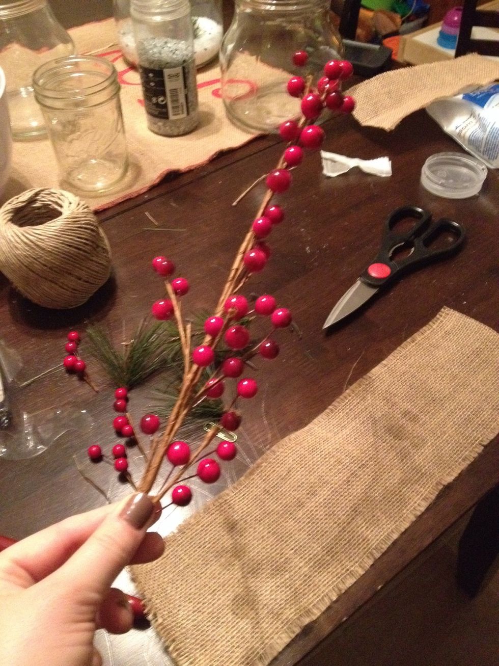 I got the berries at Michael's. I cut a small piece of the berries so I was left with only 3 or 4 berries per candle.