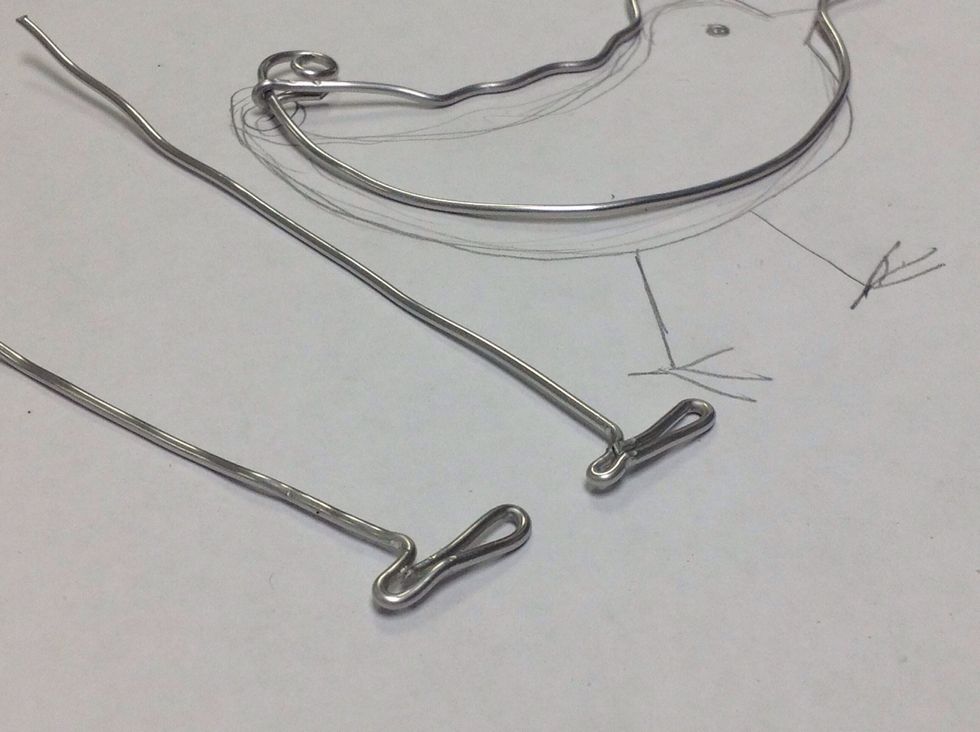 I had a hard time with the feet, so bent them this way.