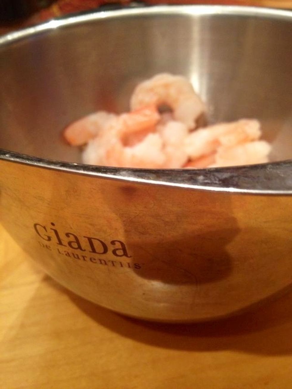 I had pre-cooked shrimp, so I just threw it in after I added everything to my rice. Since it's pre-cooked it mainly needs to be heated through.