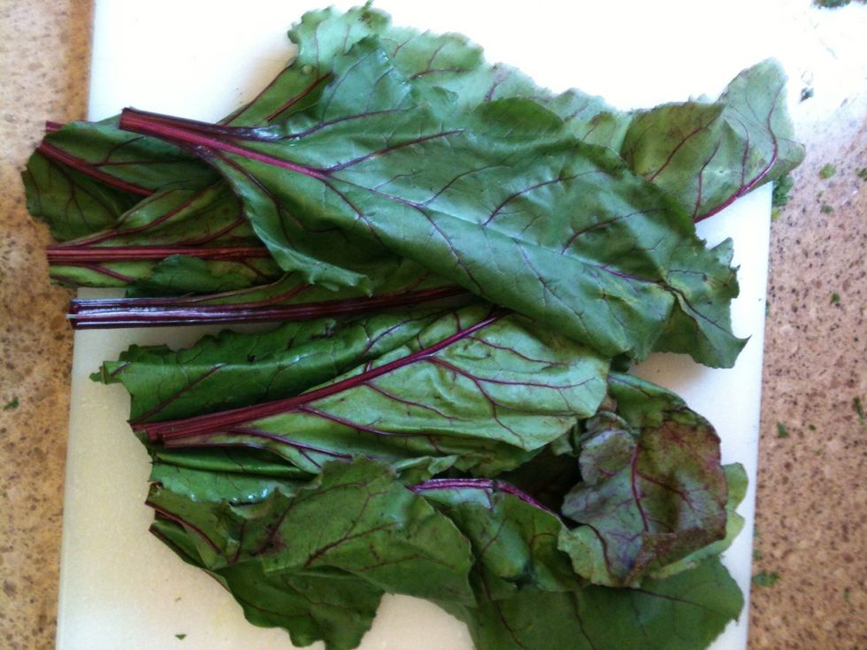 I had some beets from my local farm, I decided to use the greens from those also. Remove the leaf from the stem, chop and add to sink. Toss the stem.