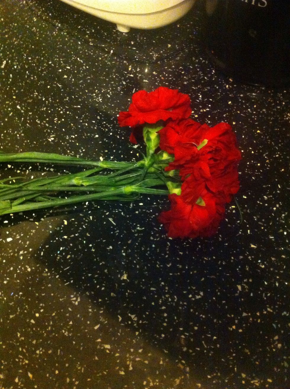 I had some flowers that were on the verge of dying because i hadnt put them in a vase!! So i put em in a jar...