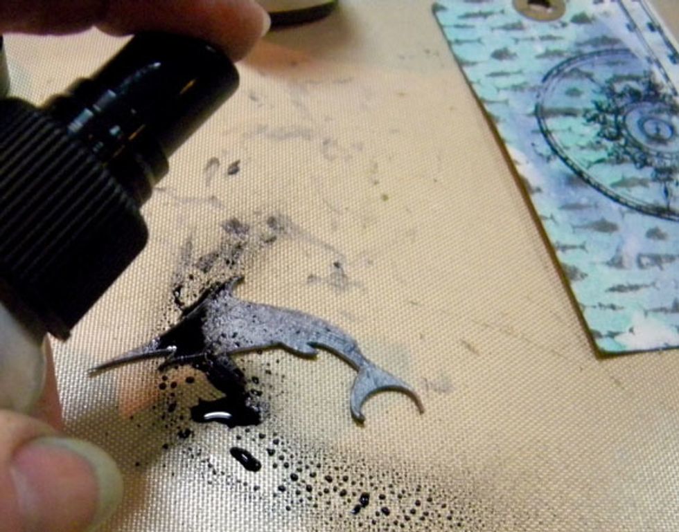 I had this cool word veneer fish from 7 Dots Studio and painted it using Ash Velvet paint. It wasn't dark enough so I sprayed it with Raider Colorations Spray and let it dry. Perfect!