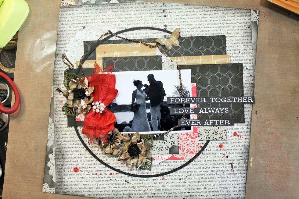 I had to add a butterfly! Now, add your hand-made flowers and some leaves. I used the Prima Forest leaves die. Add the title.