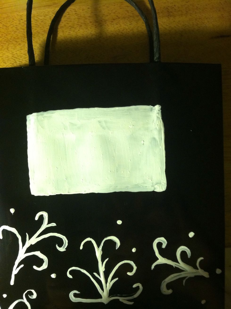 I had to paint a white square first so the teal would show up better and pop. You can skip this step if you have a lighter bag although it does help. I used the bigger brush for the square.