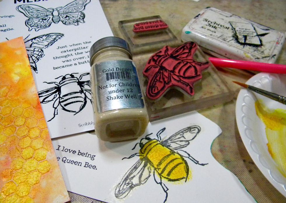 I had to use my new Dina Wakely stamp set! Stamping with permanent ink, paint the bee and butterflies with Sorbets, which are more transparent. Gold Digger is a great color for wings.