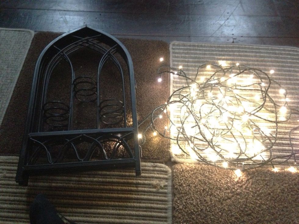 I hate when it's time to pack away our Christmas lights so I decided to keep them as a feature in my living room so I can enjoy them all year long! I'm using a gothic style frame and my tree lights.