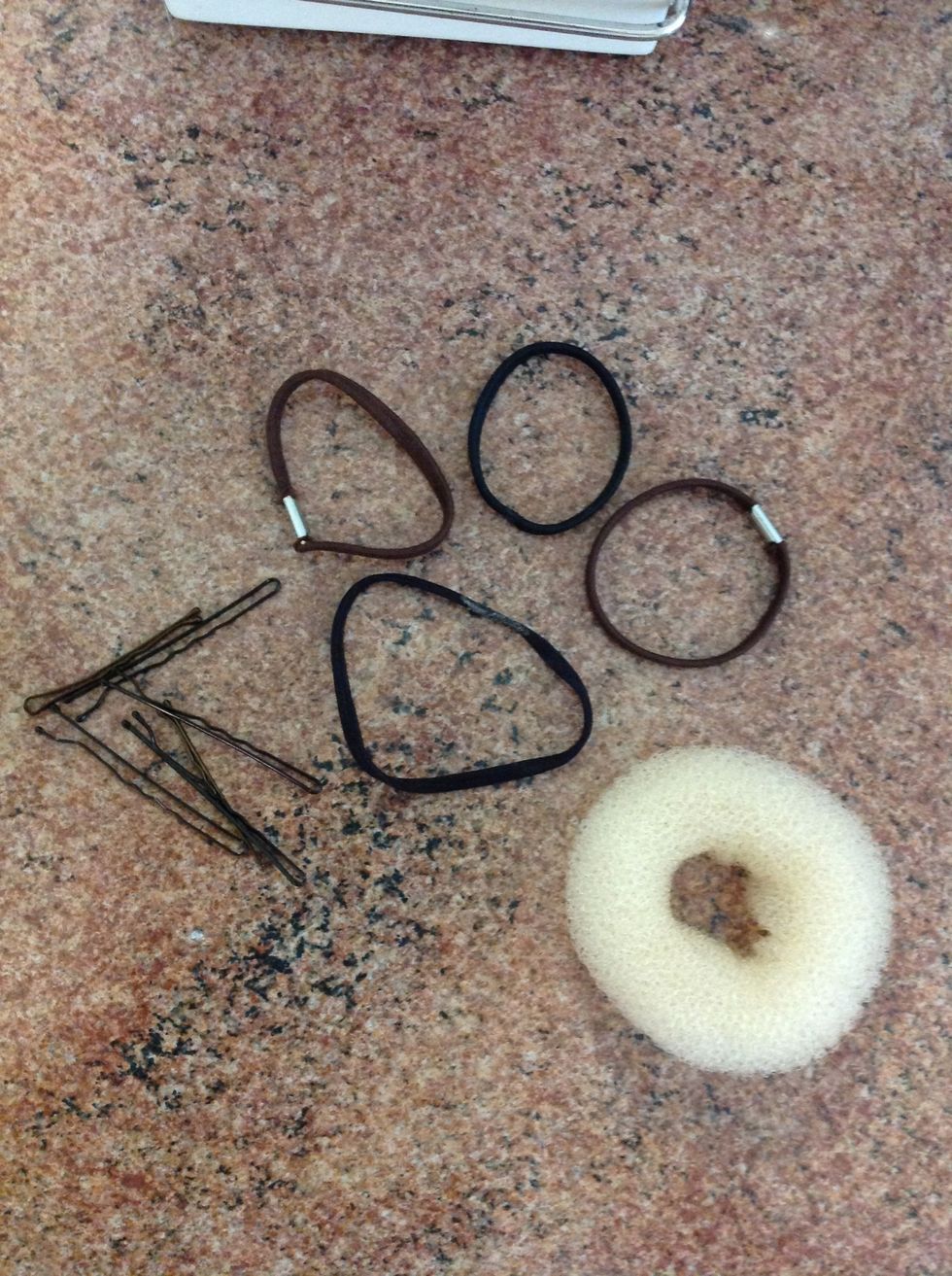 I have a bought sock bun, but you can make your own. These are all the materials you will need.