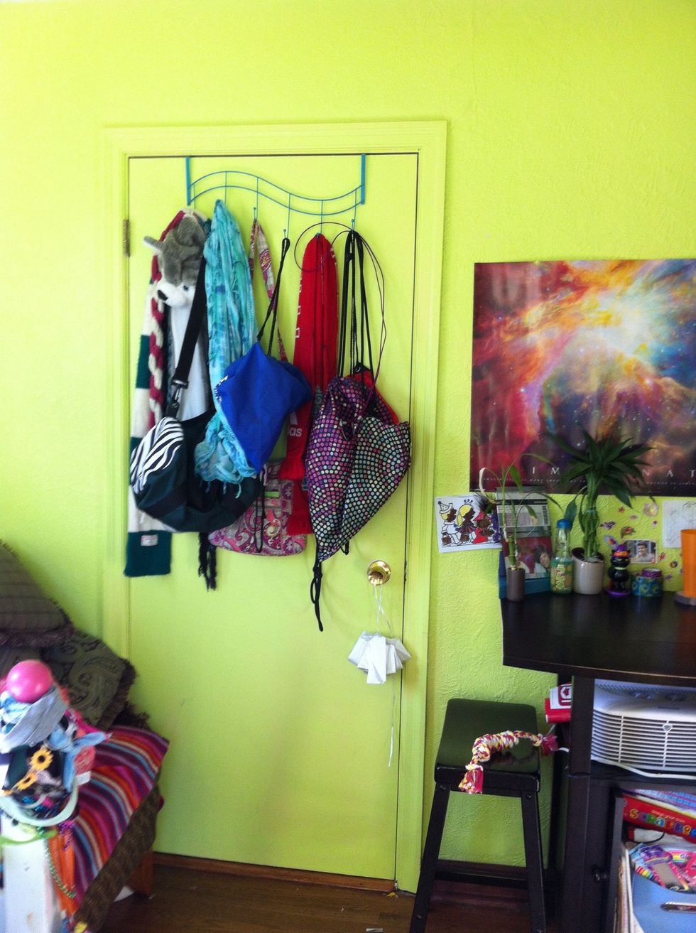 I have a door that separates my room between my younger sisters. There's a door hanger on it that I hang all my bags on. I got it at target about a year ago and it hasn't broke yet!