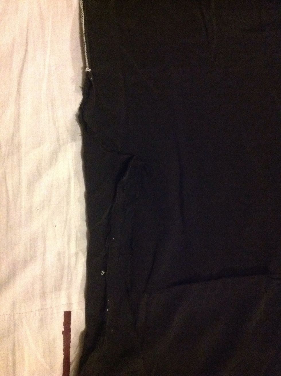 I have folded the extra triangular piece of cloth near the fork which we need to cut off.