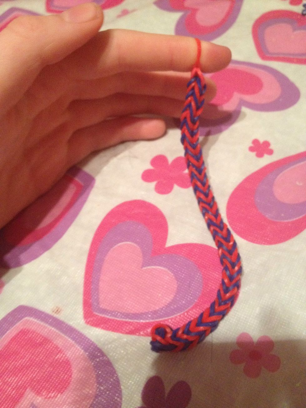 I have it on my finger. All I did was take the elastics and put the on one pencil. Then transferred it to my finger.