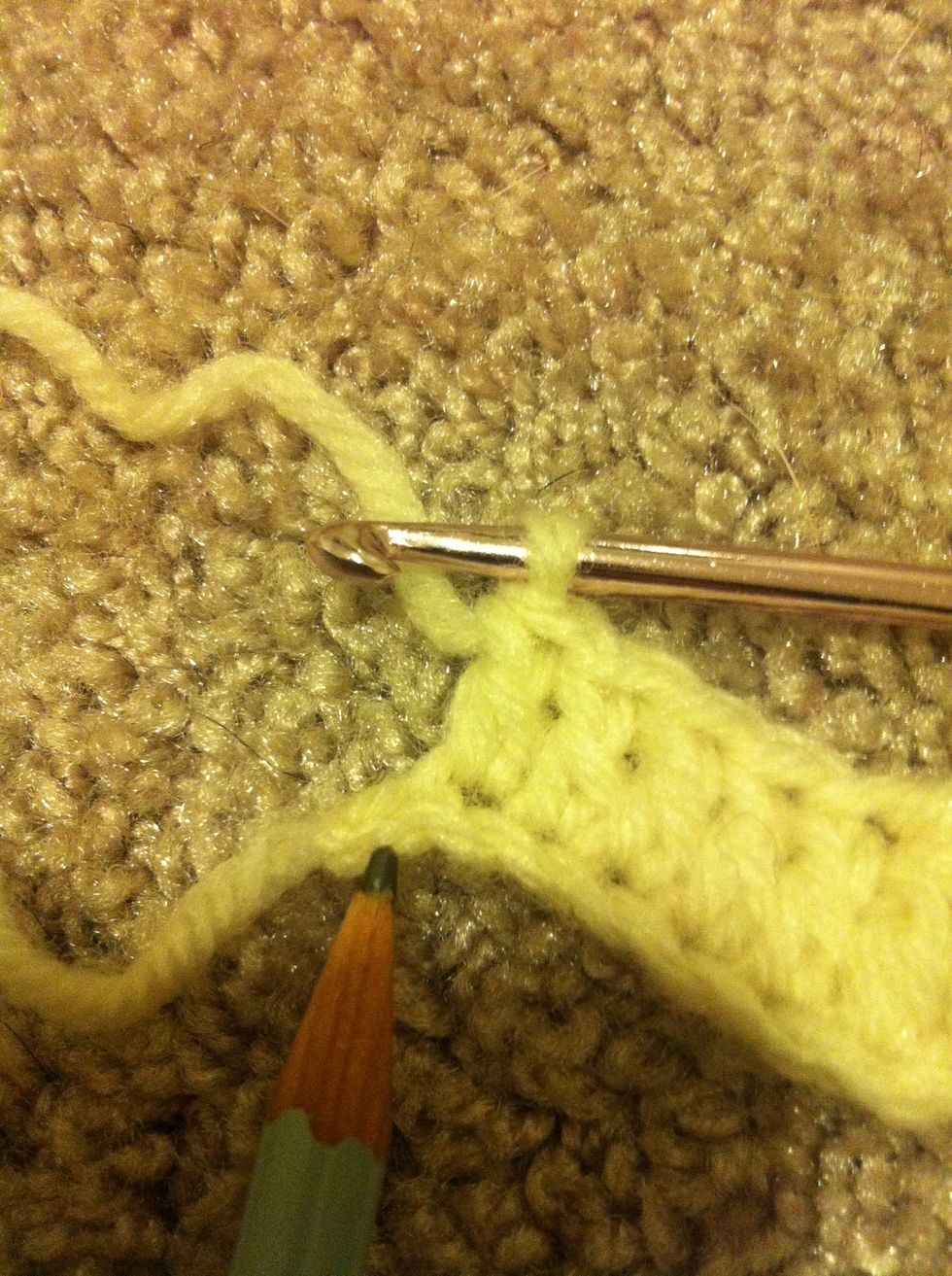 i have one chain left now. if you make a larger size blanket you keep repeating the shell now.  at the end of your first row (independently of the size) you will have this one chain left...