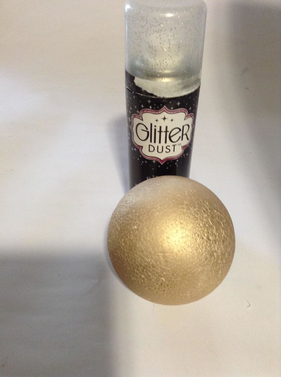 I have used a styrofoam ball and apply gold glitter spray to be covered.