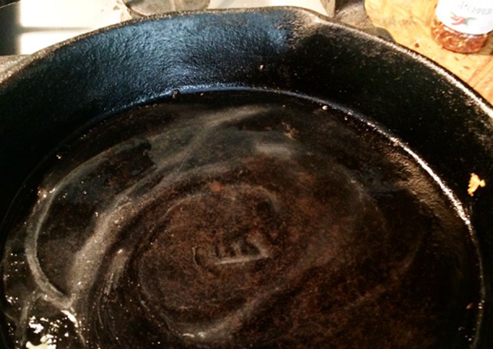 I heat up my skillet.. when it isn't used for domestic violence against my husband it makes a great cooking utensil. In this case buttered up on mid-high heat.