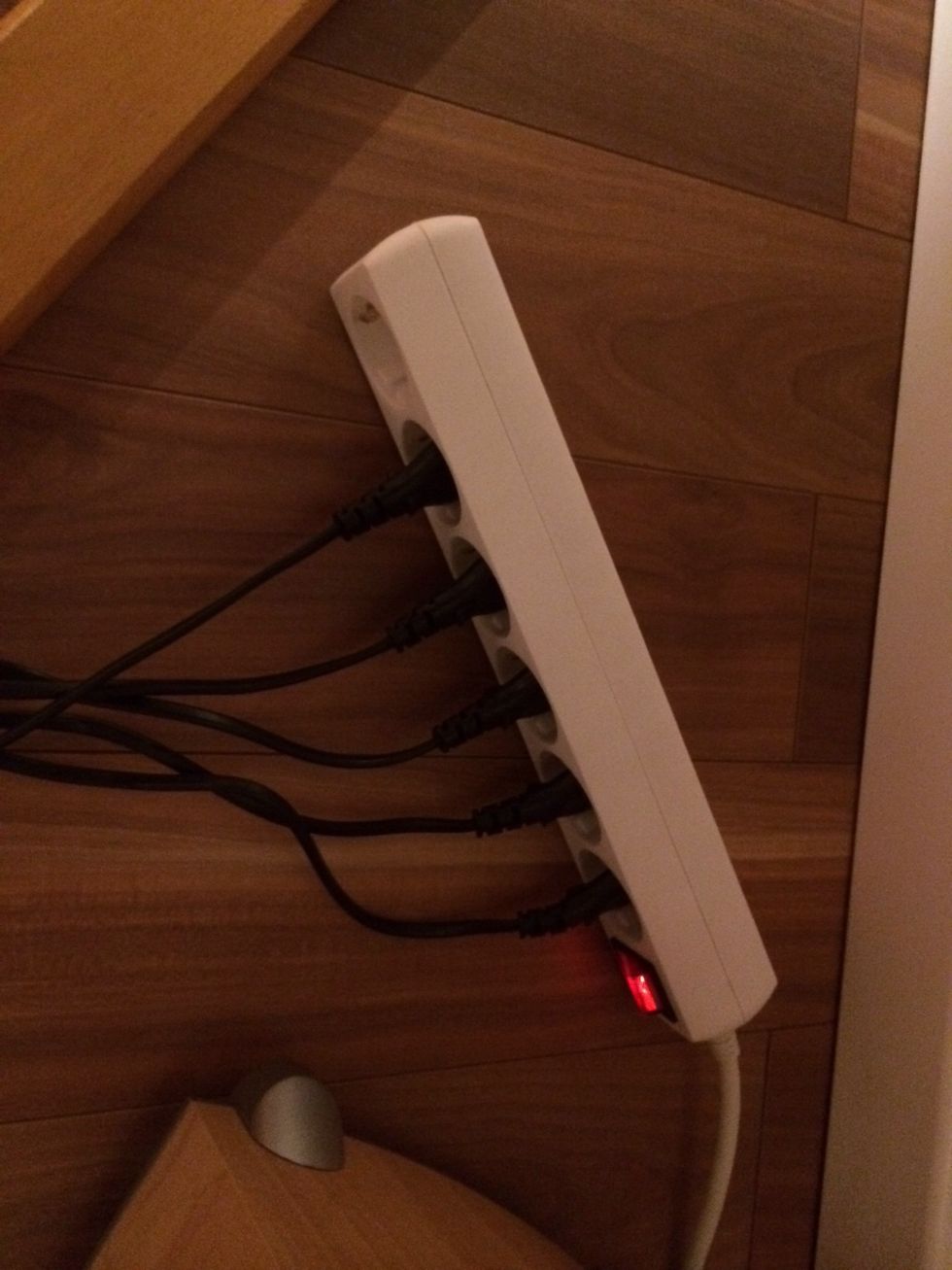 I hid the plug board behind the chair and connected it to a radio receiver. This way I can turn him on & off using a remote.