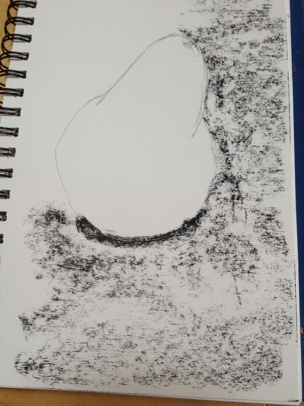 I hit the umbra with an additional stroke of the square charcoal. Its not a detail tool on such a small page, but I can refine as I go.