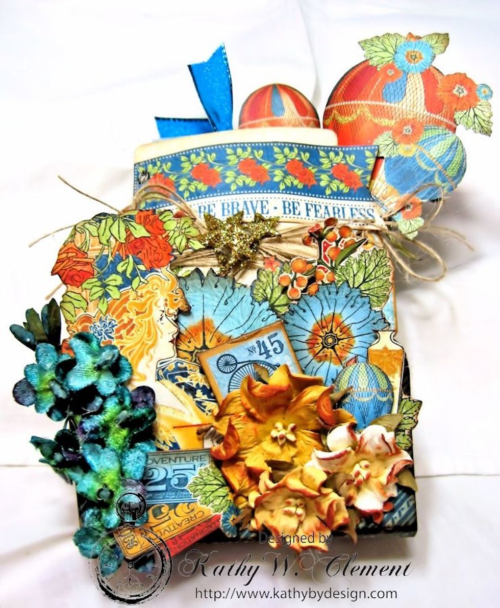 I hope you'll have fun making this little pocket.  It can easily be adapted for any theme or occasion.  Thanks for viewing!