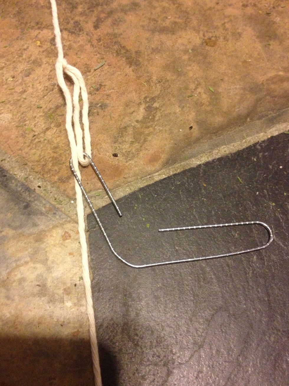 I hung mine from a railing so I made loops on a string and put paper clips through the loops. I then put the paper clip through the elastics wrapped around the lavender and hung them upside down.