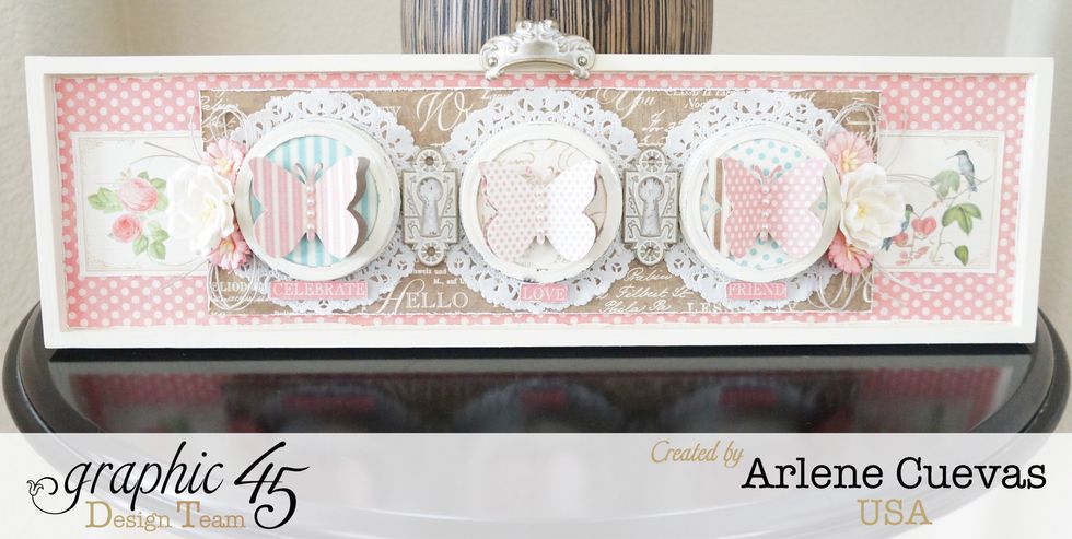 I incorporated some white doilies and Graphic 45 metal staples...