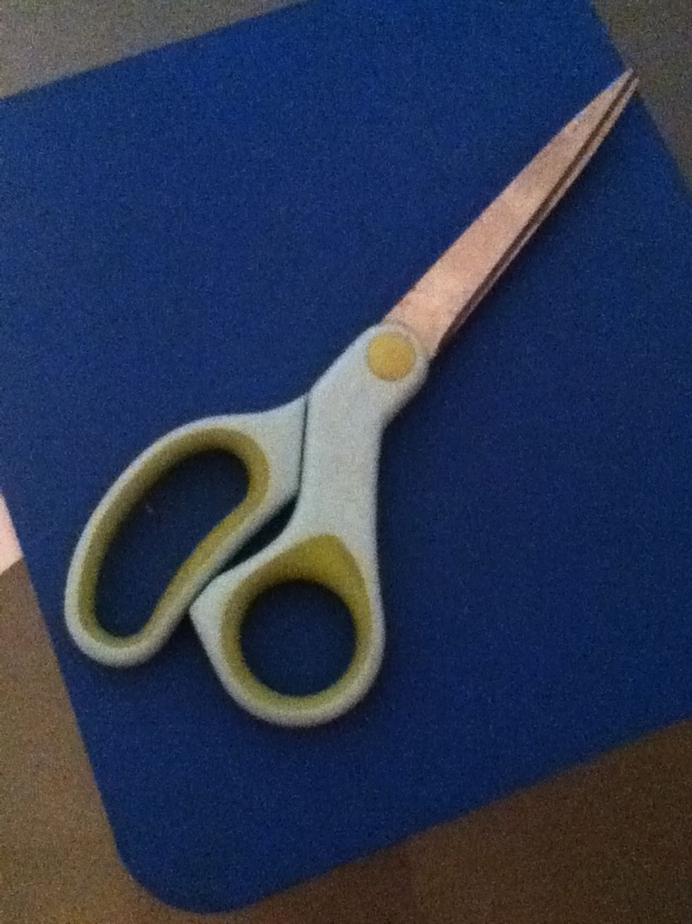 I just cut a small and thin circle using a flap of a cardboard box, and then threw away the scraps