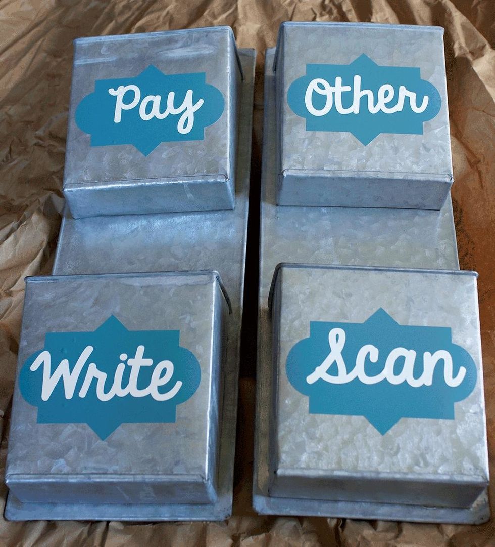 I just eyeballed the letter positions, but feel free to measure. I will next time, since mine aren't exactly perfectly centered. Use the side of a credit card to scrape out any air bubbles.