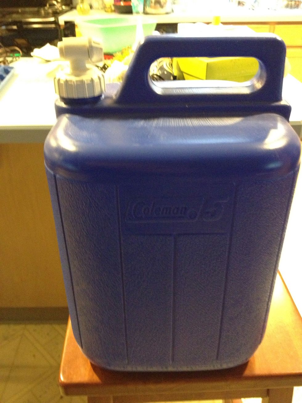 I keep a 5 gallon water tank for aquarium water. I got it in the camping section.