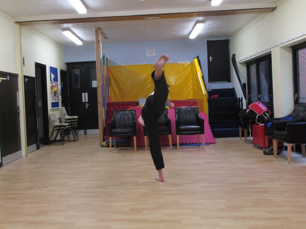 I keep the body aligned for balance. I extend the foot for additional reach. Alternatively, I could strike with the heel.