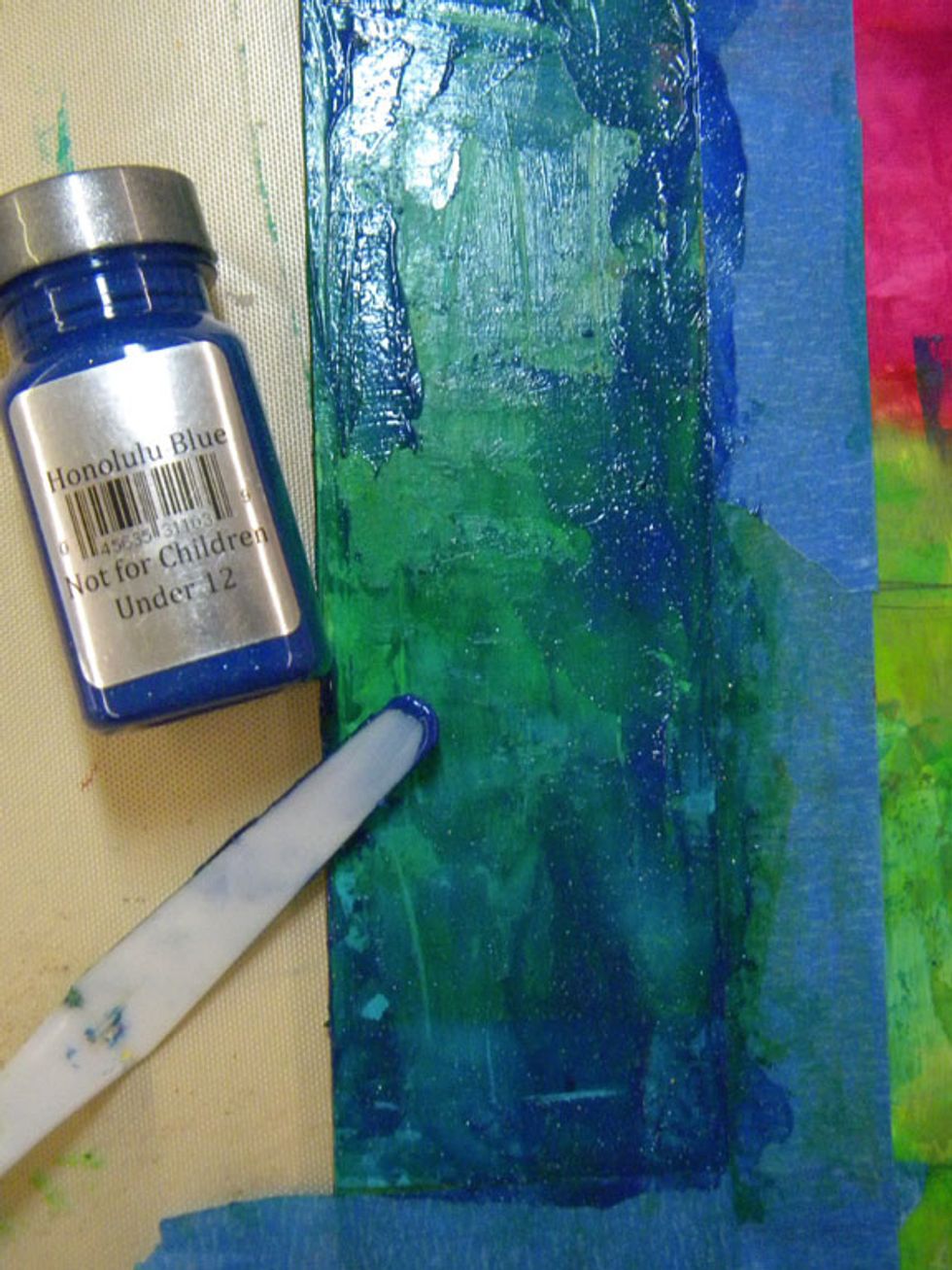 I kept adding colors to the boxes and scraping till I liked the effect. I tried to keep the cool colors and warm colors separate.