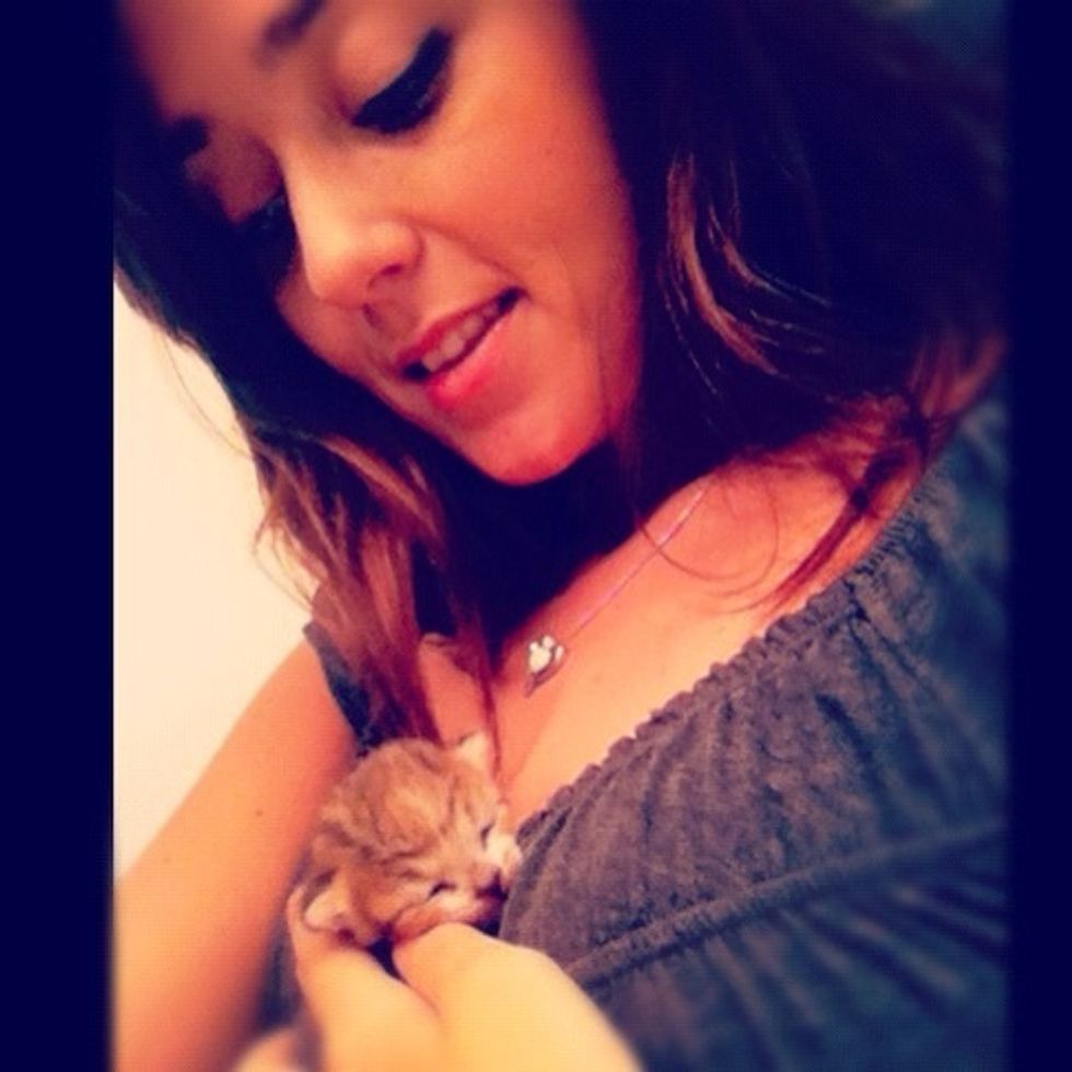 I kept her close while her eyes were still closed so she felt safe and calm. It's a fact that newborns use the sound of their mothers heartbeat to fall asleep.