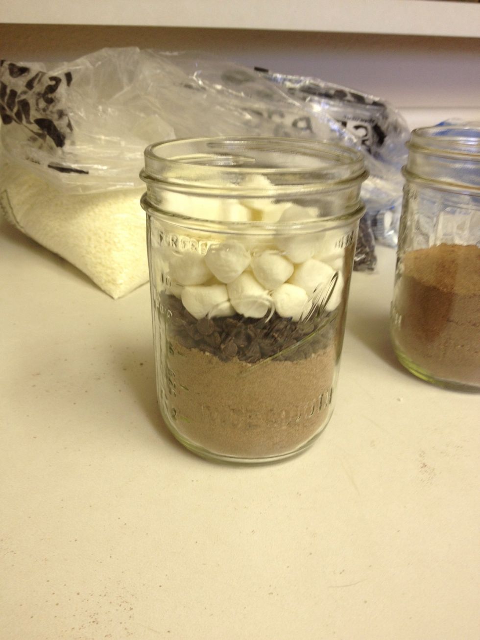 I kept it simple and just added marshmallows, but at this point you can add just about anything. Get creative and crushed up peppermint to add on top of the chocolate chips.