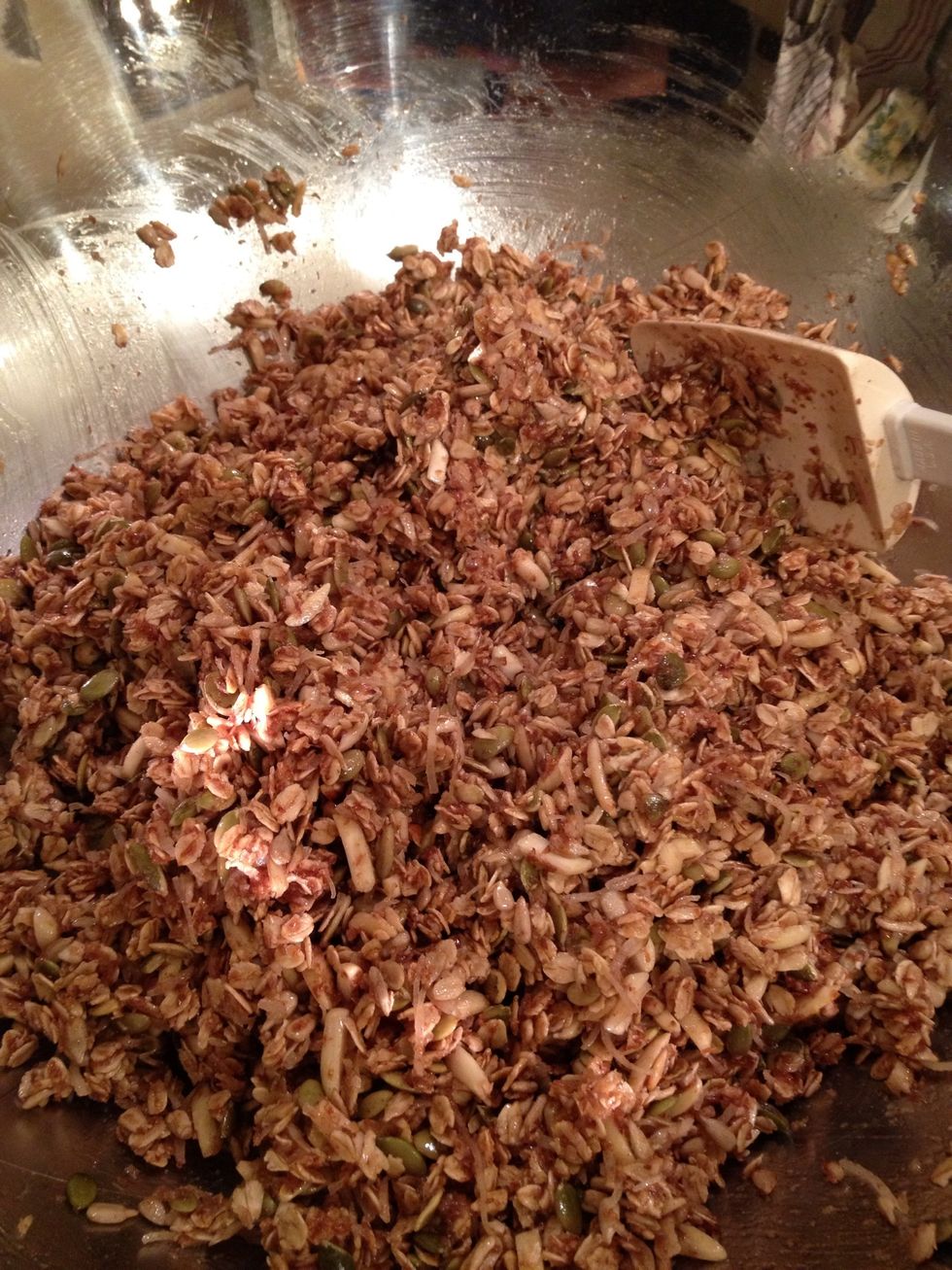 I know it seems like a lot of liquid, but the granola will dry out, as it bakes, and even more, as it cools. Incorporate the liquid evenly.