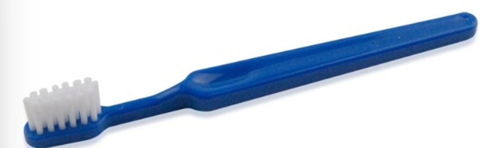 I know this sounds weird, but if you pick at your lips and regret it, gently "brush" your lips in a circular motion