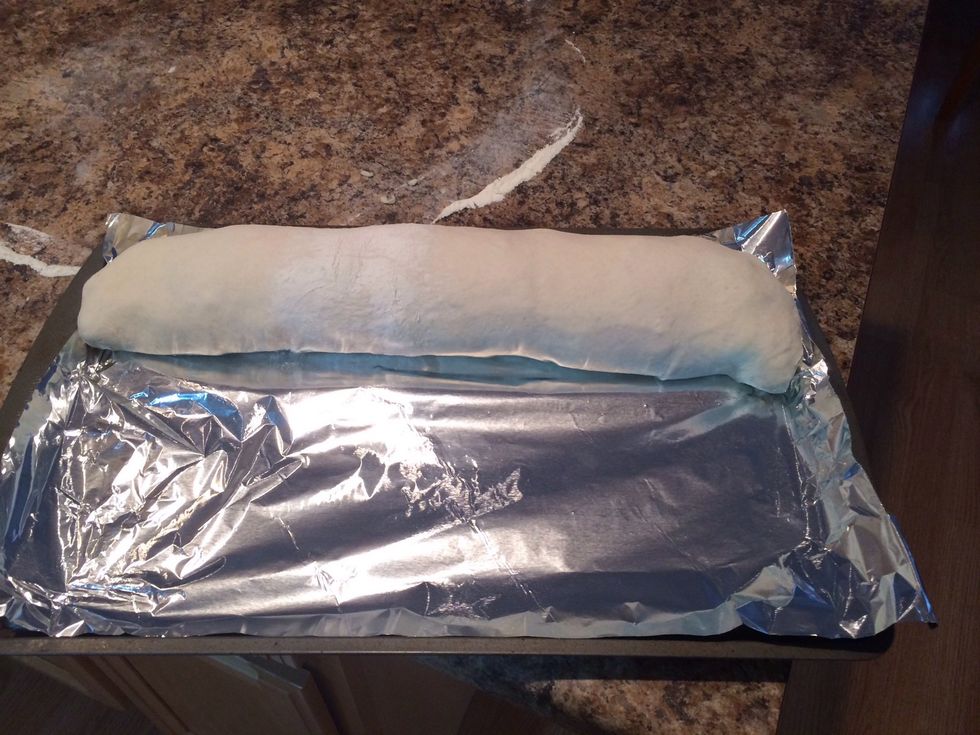 I lay a sheet of foil down for easy clean up, you can use non-stick spray it if you want.