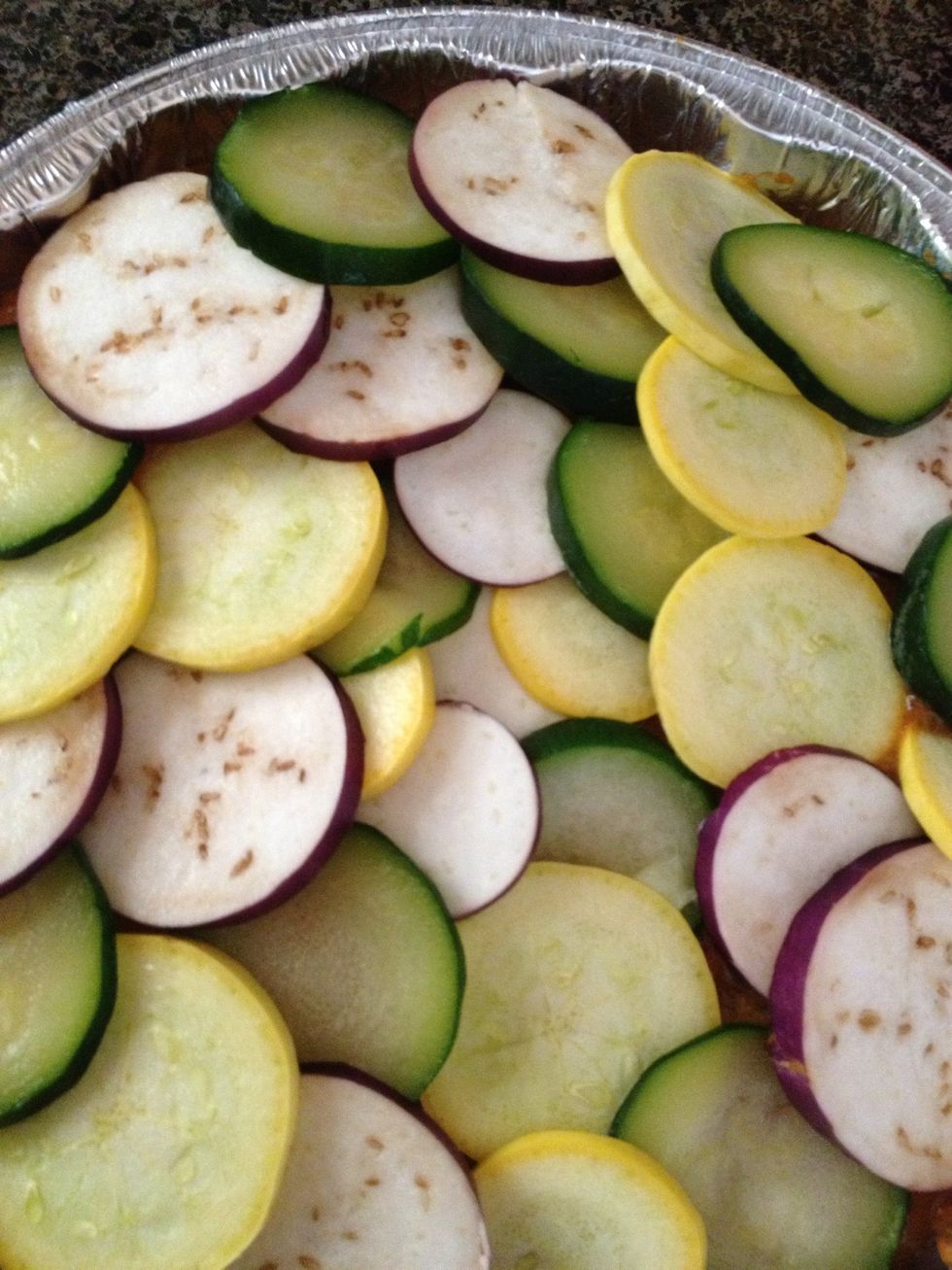 I layered the veggies again, mine looked like this but like I said you could probably do a better job. Drizzle oil on top then cover with foil. Put in the oven at 375 for two hours